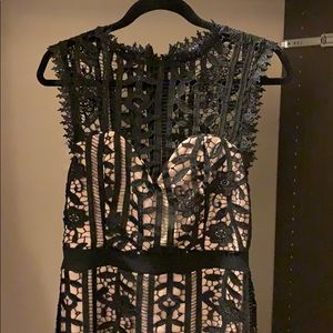 Black lace cocktail dress with gold zipper